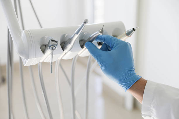 Professional Tooth Extraction technician working in Whiskey Creek, FL